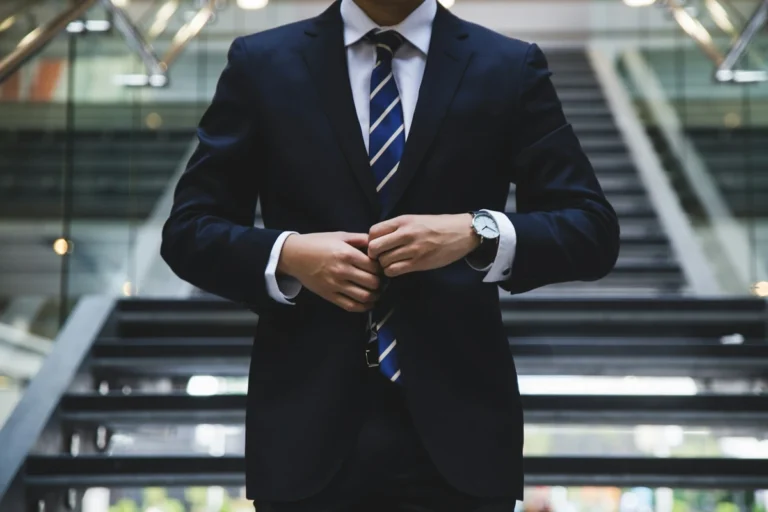 Businessman in suit with clasped hands Concept of entrepreneurship