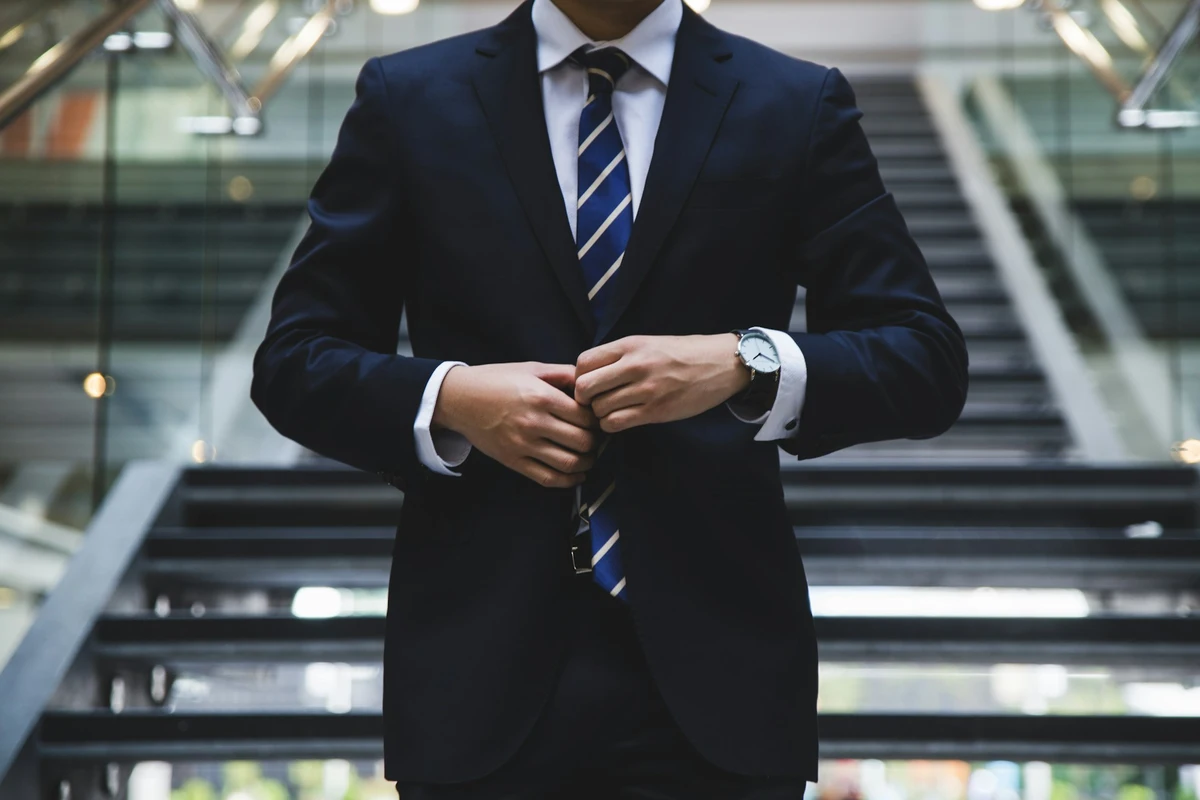Businessman in suit with clasped hands Concept of entrepreneurship