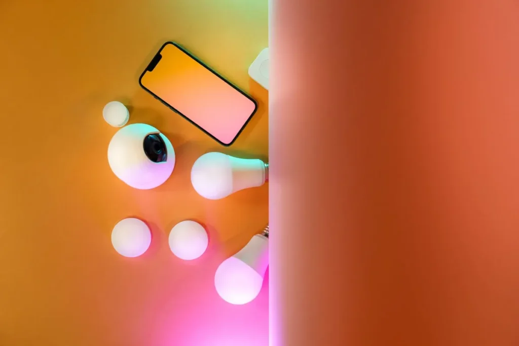 Person using a smartphone with colorful background, representing Best AI Tools for Small Business