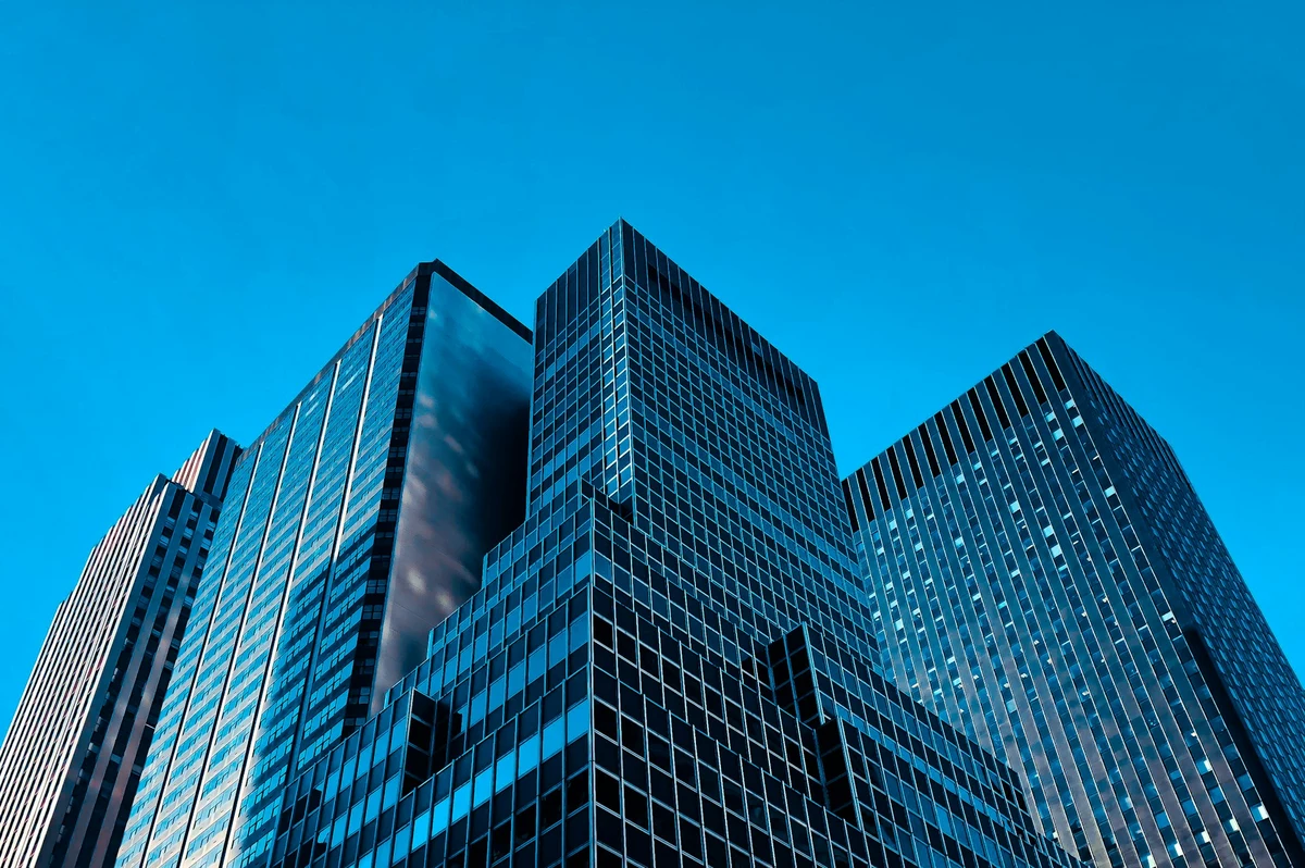 Corporate business buildings showing what is a company and how it operates