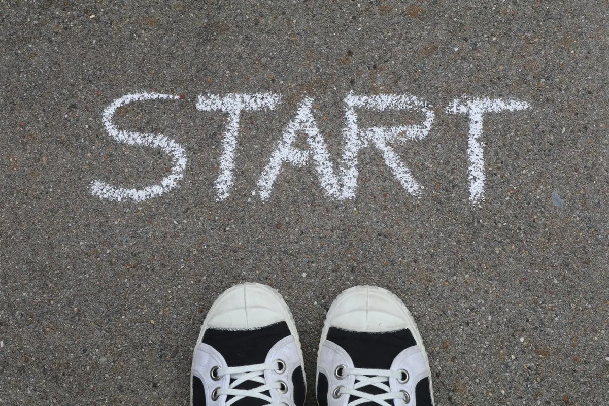 A pair of shoes on display representing step-by-step guidance for How to Start a Business