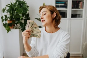 Small Business Funding Options in the USA concept showing an entrepreneur working on a laptop