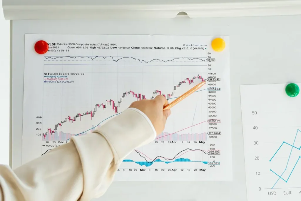 A financial illustration comparing a broad index fund and individual stocks, containing the text: "What Is an Index Fund?"