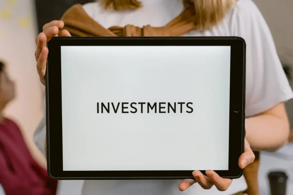 Beginner guide to what is investment showing financial planning document on a desk