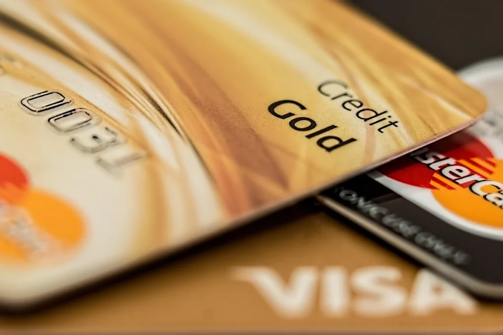 Close-up of gold Visa credit cards — What Is a Credit Card