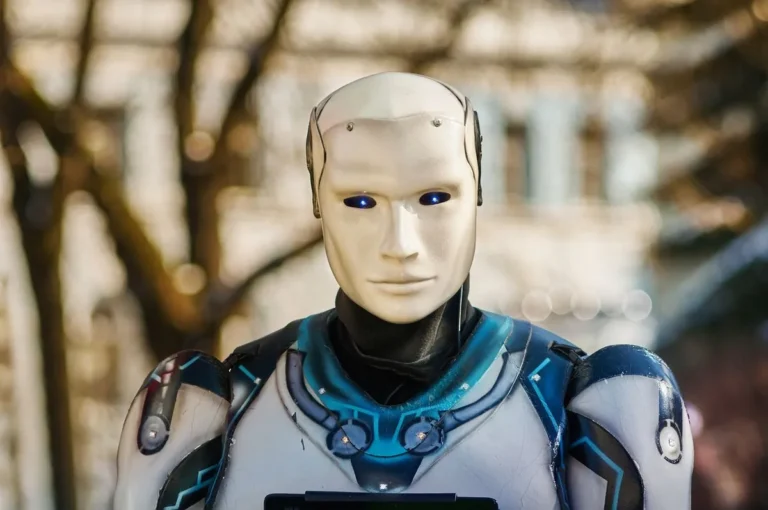 A futuristic white humanoid robot with detailed facial features, illustrating the advancement of humanoid robots in 2026 and physical AI in industrial automation.