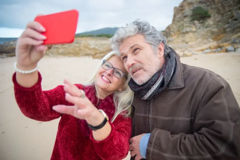 Best Countries to Retire in 2026 - An elderly couple happily planning their international retirement and reviewing financial options.