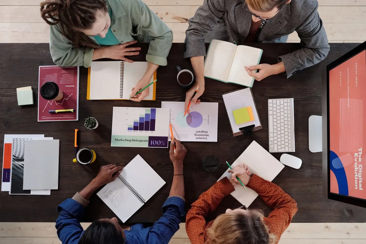 Business professionals reviewing financial documents and charts for How to Read Financial Statements Correctly