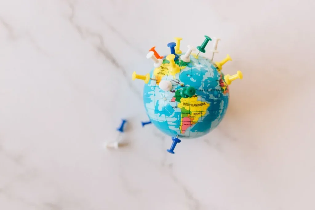 A plastic-wrapped globe representing climate change and environmental impact, illustrating how El Niño affects global business.
